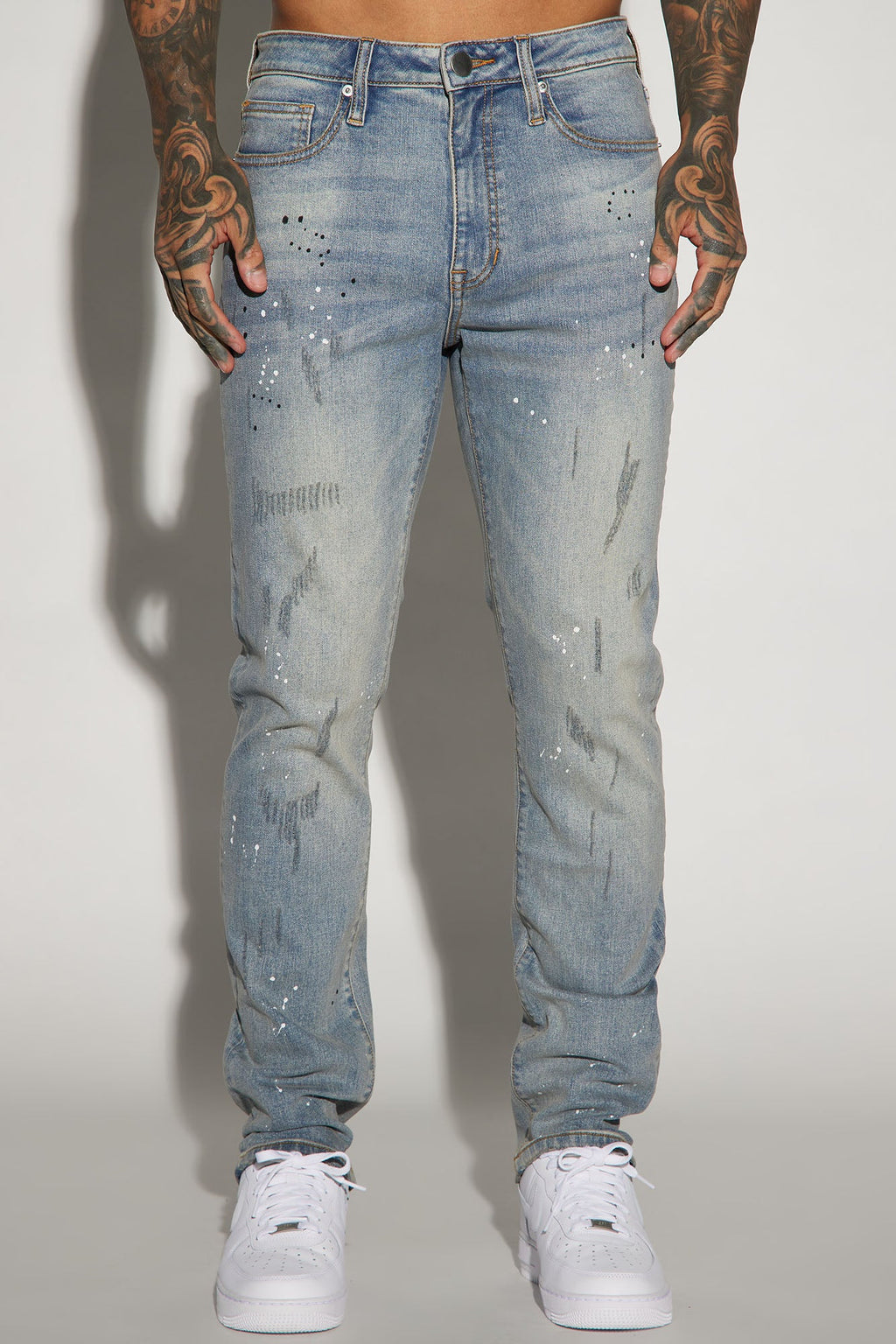 Ripped And Bleach Splatter Slim Jeans - Light Blue Wash - image 1