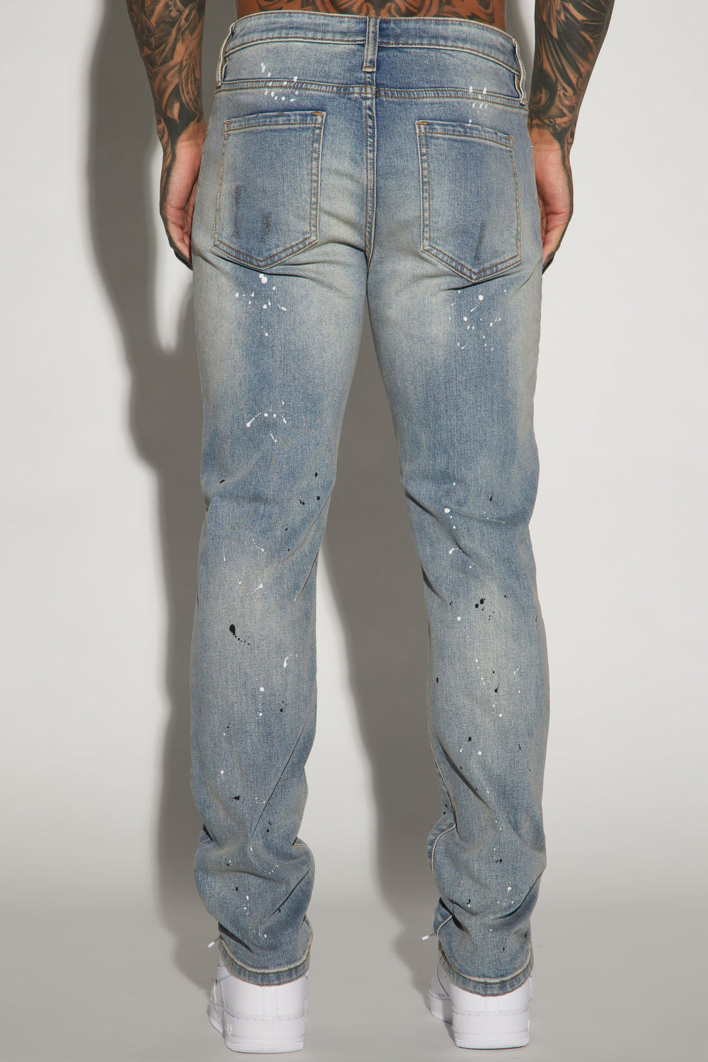 Ripped And Bleach Splatter Slim Jeans - Light Blue Wash - image 4